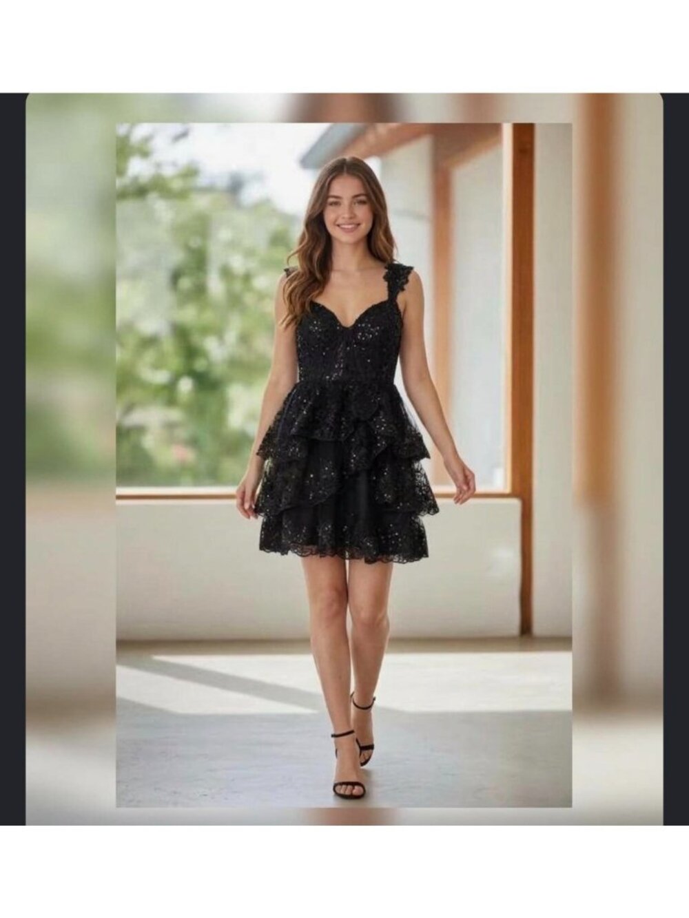 Black gown and lace corset mini dress featuring a sweetheart neckline 18w